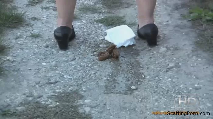 The woman sat down and took a shit on the street [HD 720p]  2024 (Actress: OutdoorScat)
