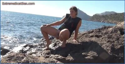 Nadya Craps Her Pants by the Sea in Filthy Dirty Scat Clip