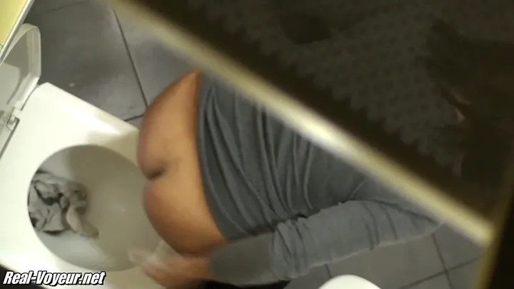 Girl Kneels and Drops a Brown Load Close to the Camera